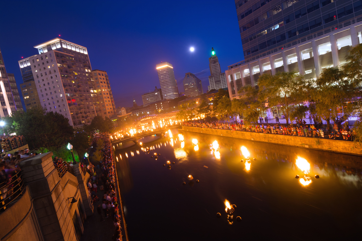 Crowds gather along Woonasquatucket river in Providence, RI